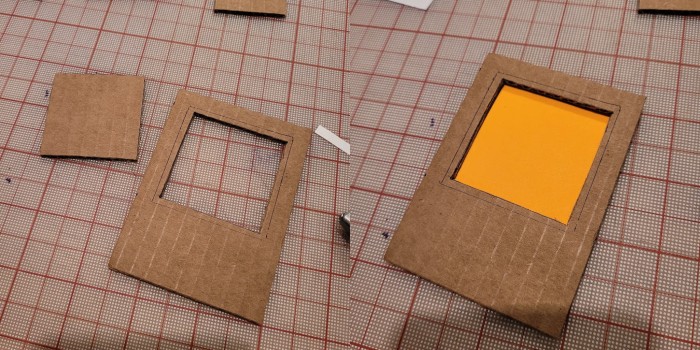 the window is cut out and displays a sticky note