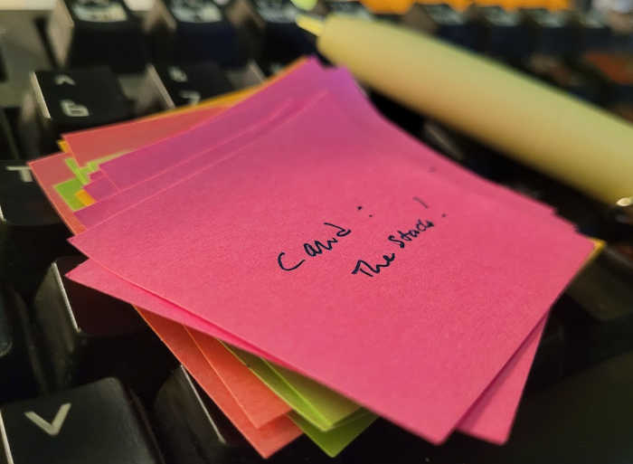 a stack of genuine 3M brand Post-it notes