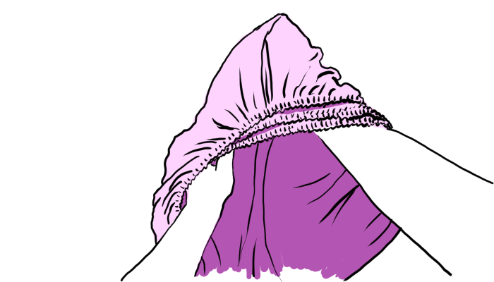 Right hand is now in the corner pocket and left hand is tracing inner fold to the left.