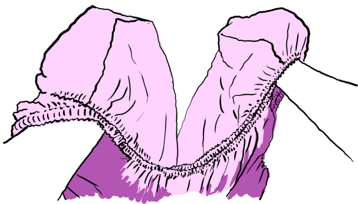 Two hands are now inside opposite pairs of corner pockets with the sheet doubled between them.