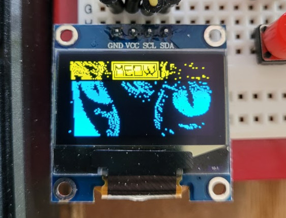 cat eyes on oled screen with each row of 8 pixels off by one pixel