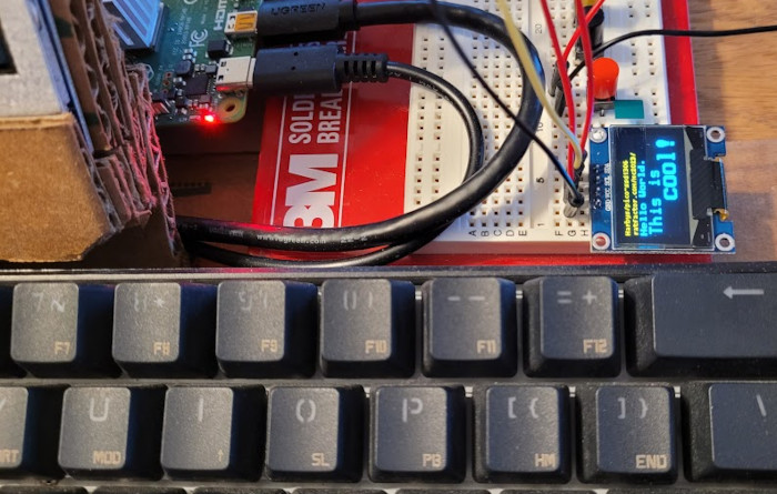 shot of the oled with keyboard for scale